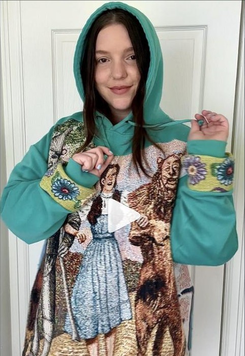 Hand-embroidered Wizard of Oz hoodie, rebuilt from a vintage tapestry blanket